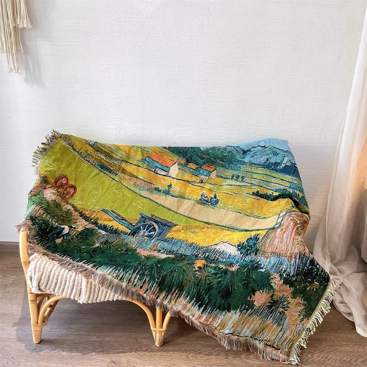 Pleteni prekrivač s motivima Van Gogha za dekoraciju sofe